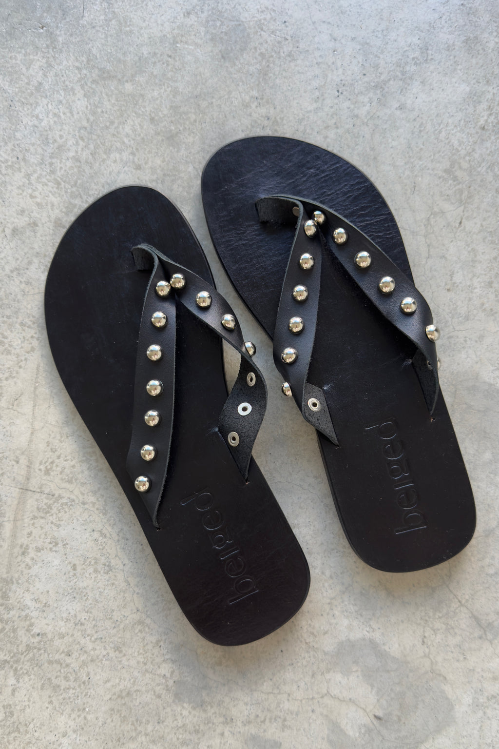 Studded leather flip flops